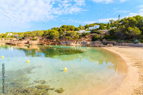 View of beautiful Cala Gracio beach and bay at early morning, Ibiza island, Spain photo