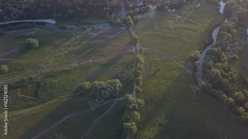 flight of the drone over the fields and rivers photo