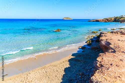 Fototapeta Naklejka Na Ścianę i Meble -  View of Cala Nova beach on sunny summer day, Ibiza island, Spain