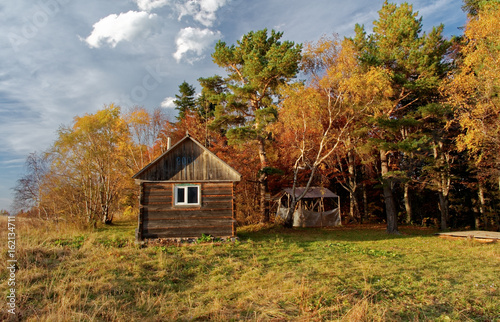 Forest house at sunset. Caucasus. Russia. The Caucasian reserve. Pasture of Abago. Kotov's House