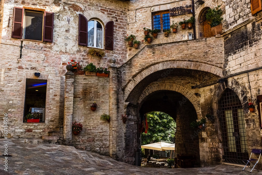 Street in Assisi town, Umbria, Italy