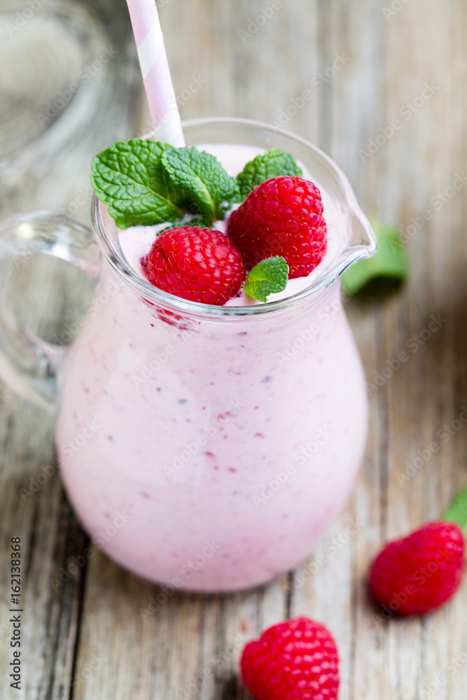 Raspberry milk shake with mint decor. Raspberry milk shake with mint decor.
