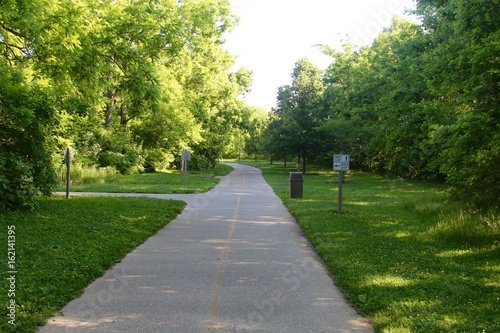The long sidewalk in the park. photo