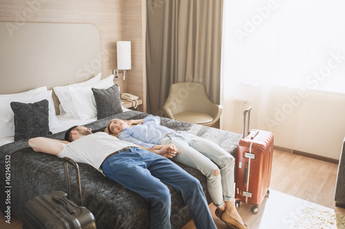 Young couple travel together hotel room leisure