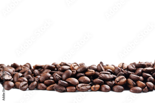 Roasted coffee beans on a white background