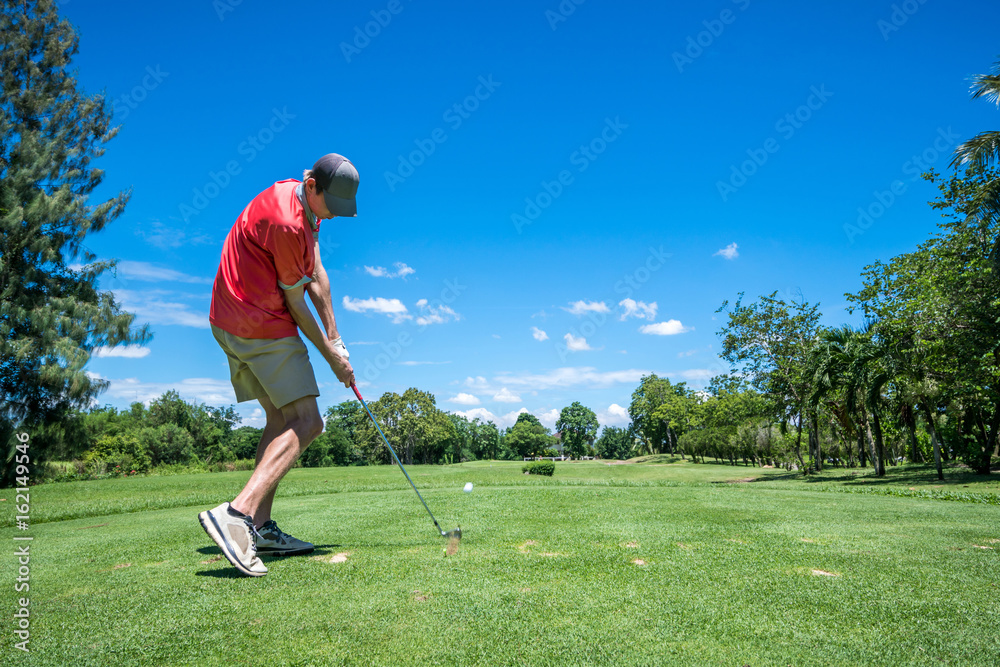 Fototapeta premium golfer tee off with golf club