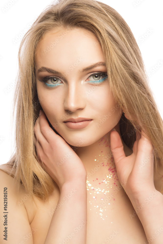 Fototapeta premium Glamorous young woman with perfect makeup and glitter on her neck. Closeup shot