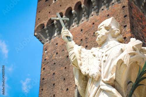 Statue of a saint in Milan, Italy photo