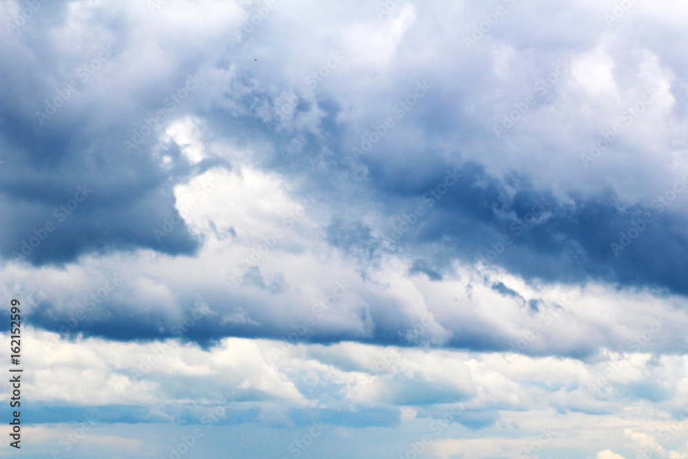 blue sky with clouds closeup, thunderclouds. blue sky with clouds closeup, thunderclouds.