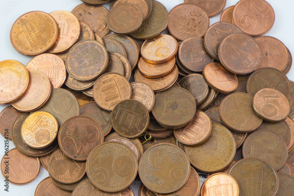 Pile of euro coins money isolated white background. / Many of small euro gold coins for design and background. Pile of euro coins money isolated white background. / Many of small euro gold coins for design and background.