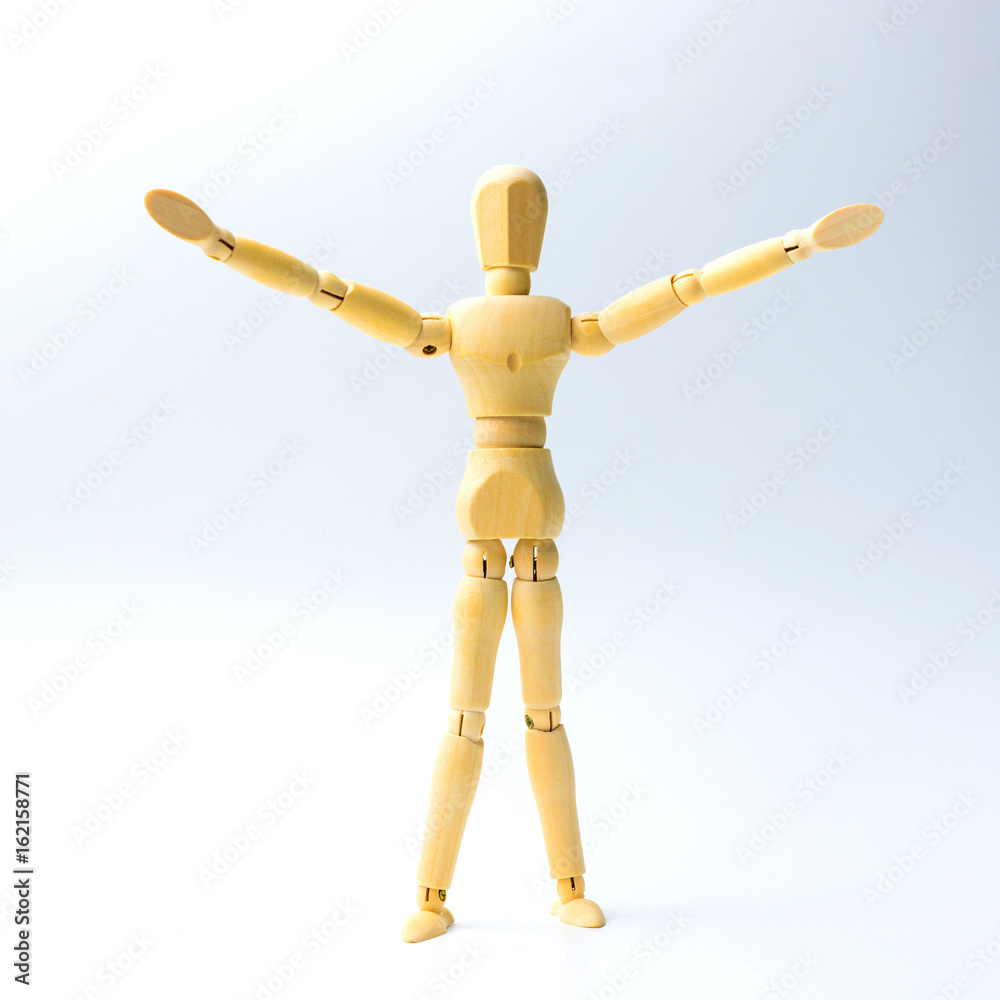 Wooden figure doll with Stretch arms to hug for peace concept Wooden figure doll with Stretch arms to hug for peace concept