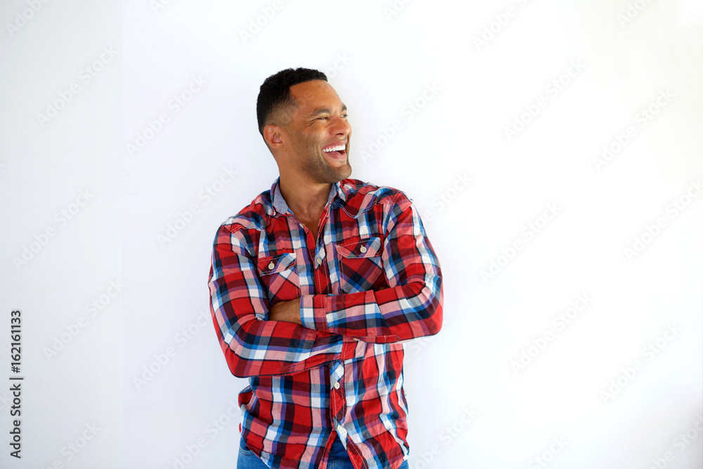 smiling african american young man looking away smiling african american young man looking away