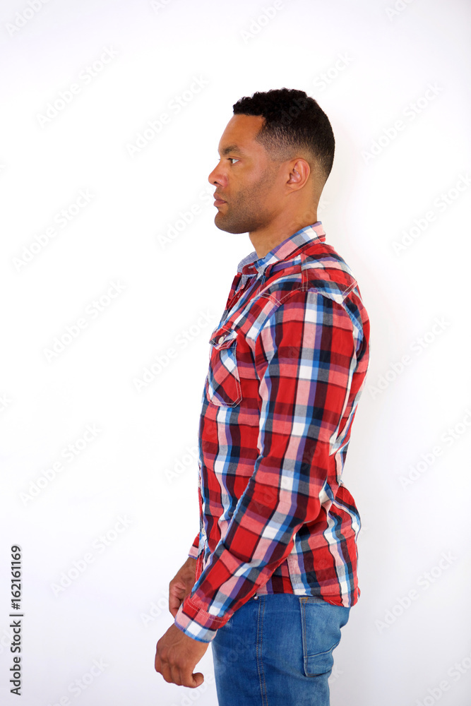 Side portrait of handsome african american man with checkered shirt Side portrait of handsome african american man with checkered shirt