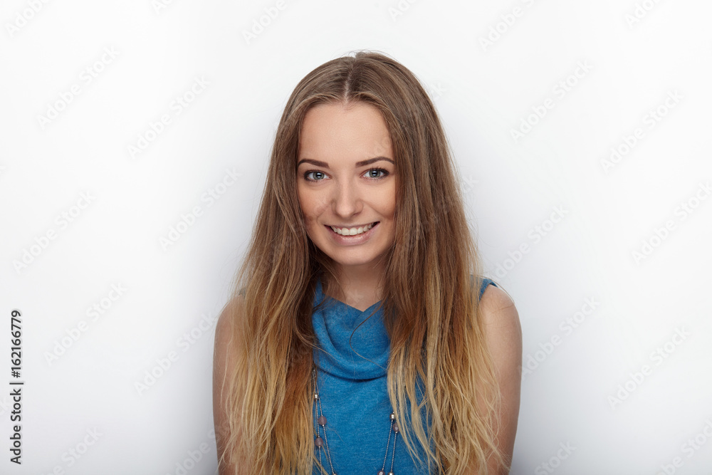 Headshot of young adorable blonde woman with cute smile on white background Headshot of young adorable blonde woman with cute smile on white background