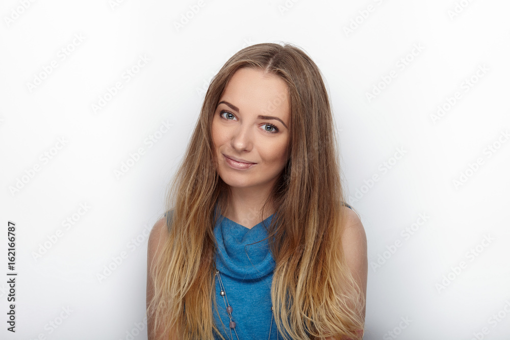 Headshot of young adorable blonde woman with cute smile on white background Headshot of young adorable blonde woman with cute smile on white background