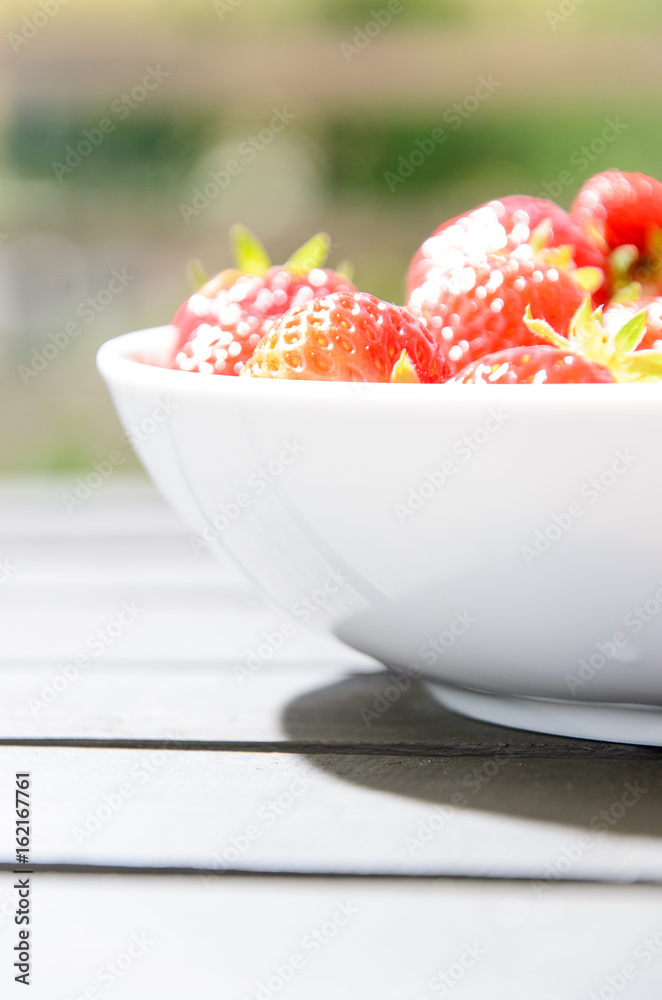Strawberries on a white plate