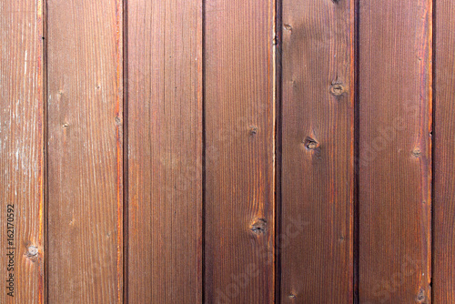 Wooden background of boards shot down vertically © Nikolay