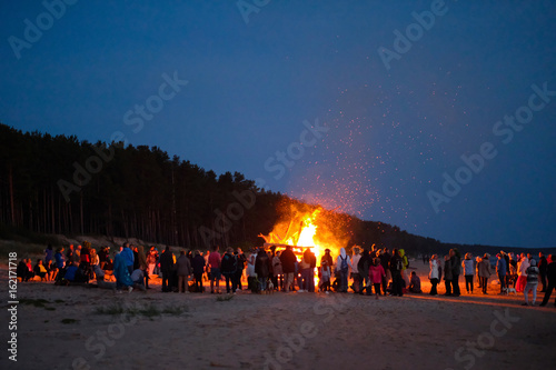 Celebrating the summer solstice on the shore of the Gulf of Riga. Latvia.