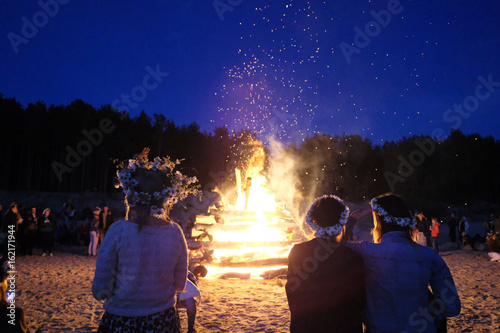A large fire at the celebration of the summer solstice on the shore of the Gulf of Riga. Latvia.