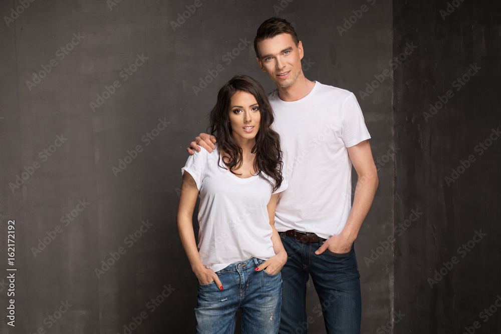 Happy casual couple in jeans