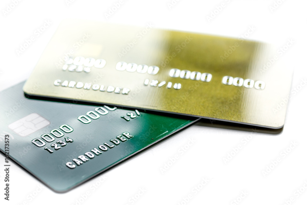 work place with business credit cards for payment on white desk background close up work place with business credit cards for payment on white desk background close up