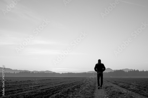 Monochrome rear view of silhouetted person