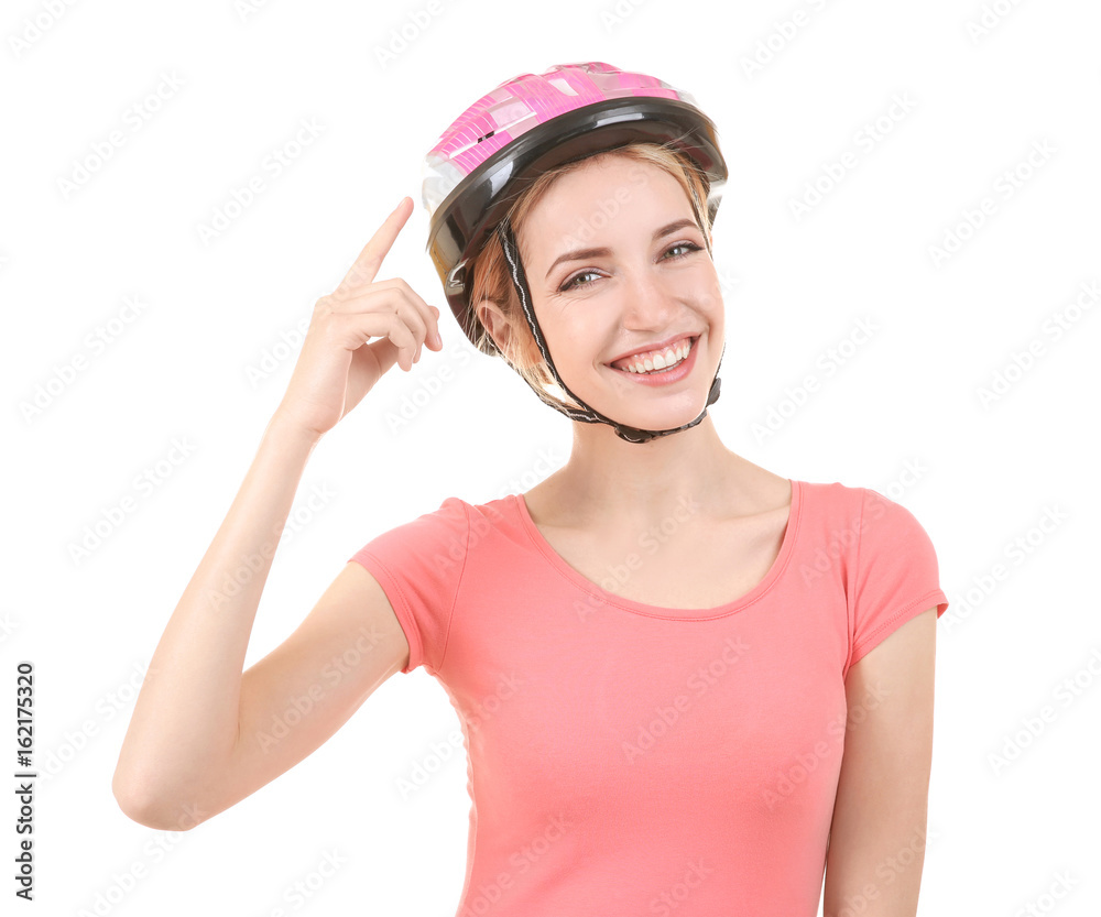 Beautiful young bicycle rider with helmet on white background Beautiful young bicycle rider with helmet on white background