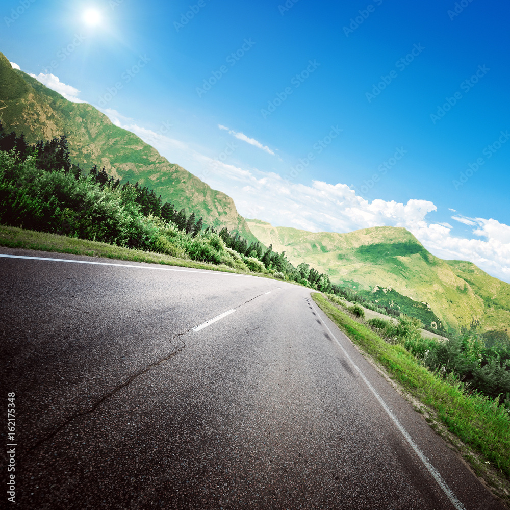 Naklejka premium Road in mountains