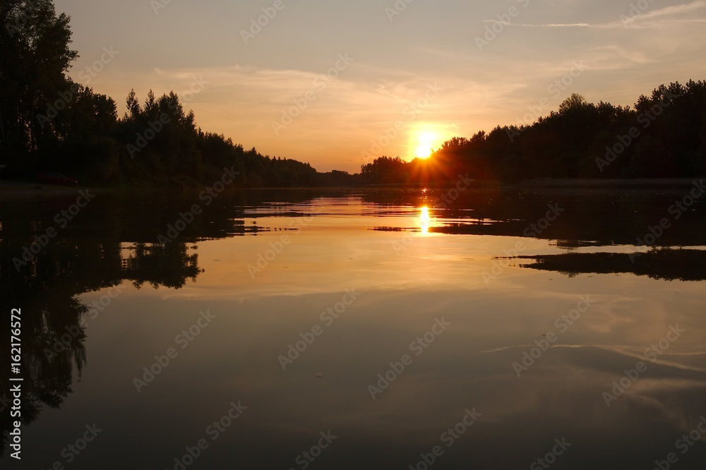 Fototapeta premium Sunset over a river