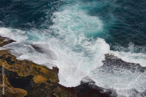 Waves hitting shore