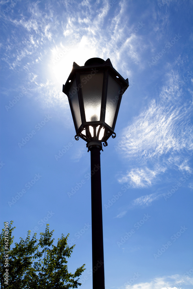 Lamppost on the blue sky