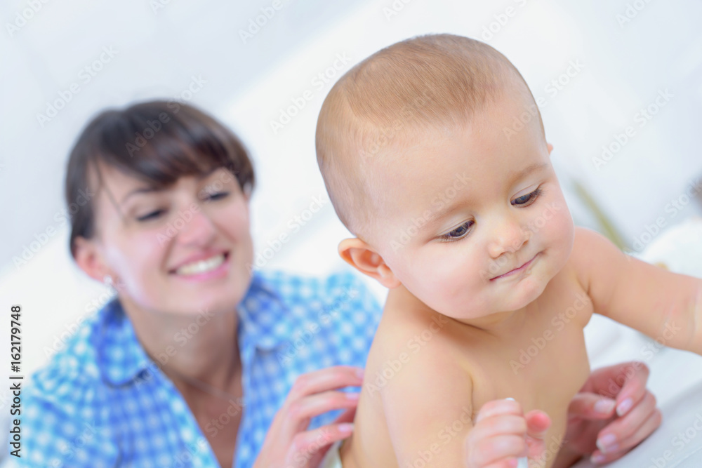 portrait of happy mother and baby at home portrait of happy mother and baby at home