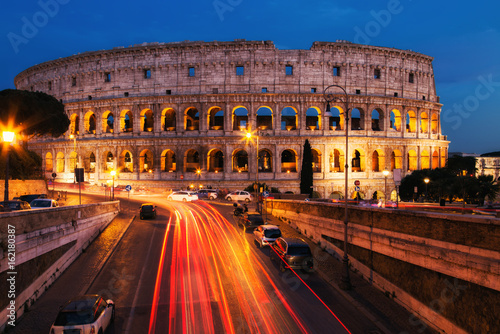 Платно Colosseum in Rome at night. Italy, Europe