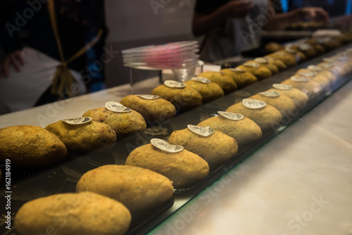 Cooking show at Pastel de Bacalha store in Lisbon, Portg=ugal photo