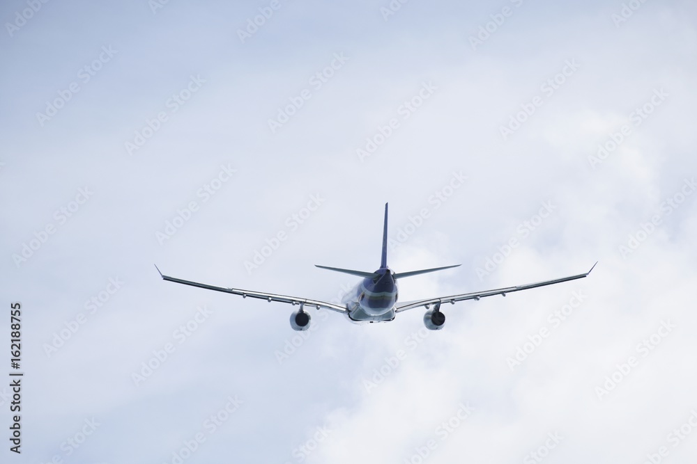 Airplane take off on the blue sky for transportation