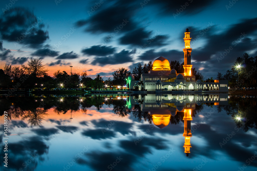 A beautiful Masjid Tengku Tengah Zaharah with its reflection during sunset. It is also known as floating mosque in Terengganu, Malaysia
