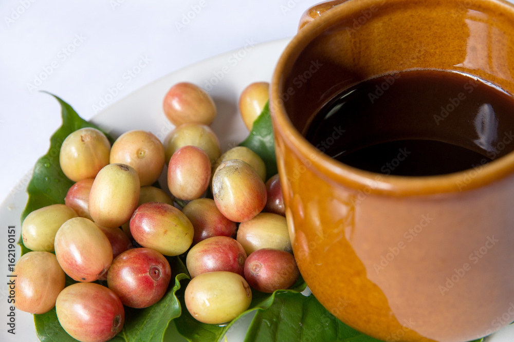 cup of coffee and fresh coffee beans cup of coffee and fresh coffee beans