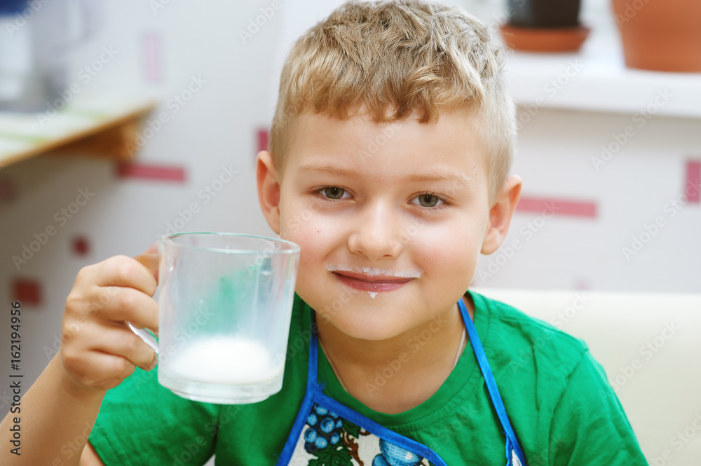 gay boy with a mug of milk .The morning Breakfast gay boy with a mug of milk .The morning Breakfast