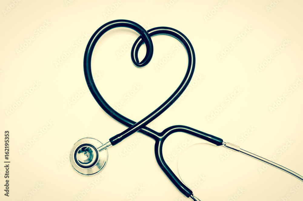 Stethoscope in shape of heart isolated on white background Stethoscope in shape of heart isolated on white background