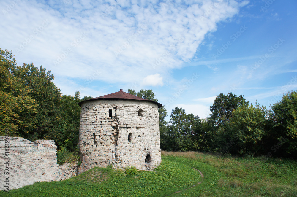 Landscape white tower with fort wall Pskov, Russia at summer