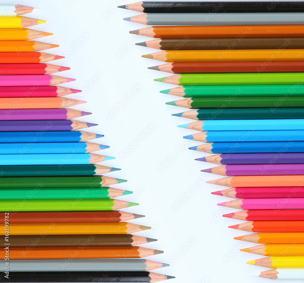 colored pencils on white background with copy space. colored pencils on white background with copy space.