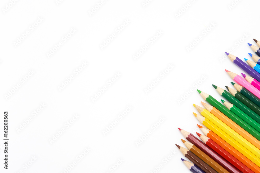 Color pencils on white background, copy space.
