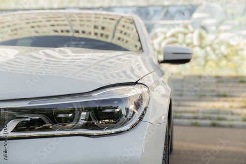 headlight of modern prestigious car close up