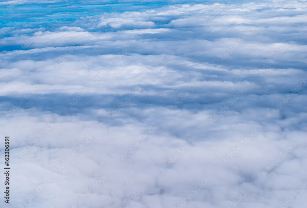 Blue sky with clouds ,view from airplane window. Blue sky with clouds ,view from airplane window.