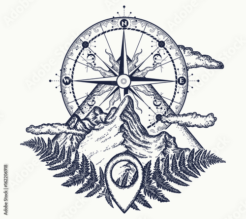 Mountains and compass tattoo. Symbol of tourism, rock climbing, camping. Mountain top and vintage compass tattoo and t-shirt design