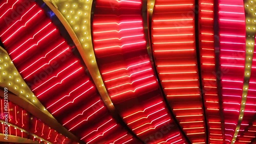 Las Vegas Neon Lights close-up. Neon flashing lights of Las Vegas Casino. Flashing neon light on the famous Las Vegas Strip. Bright night entertainment and advertisement at resort hotel and casino.
