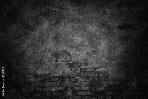 dark texture of a cement wall, black urban background