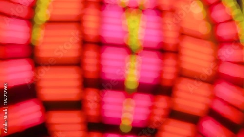 Las Vegas Neon Lights defocused close-up. Neon flashing lights defocused of Las Vegas Casino. Flashing neon light defocused on the famous Las Vegas Strip. Red Neon Las Vegas Casino Sign defocused.