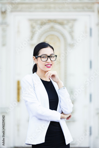 Portrait of the cheerful asian woman