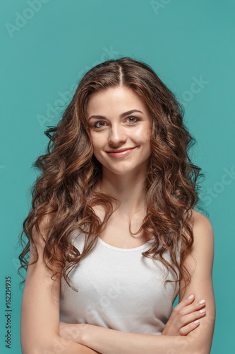 The young woman's portrait with happy emotions